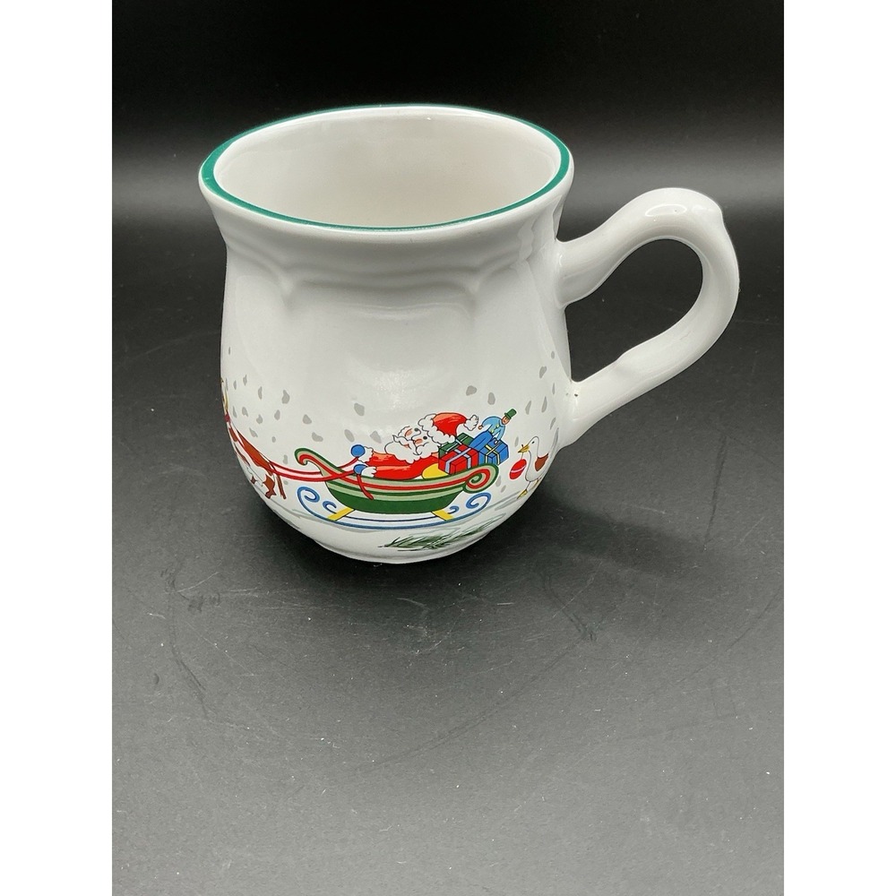 International Stoneware 12 fl oz Coffee Mug White Santa Sleigh Reindeer